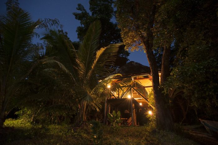 Lit up bungalow at Masoala Forest Lodge in Madagascar